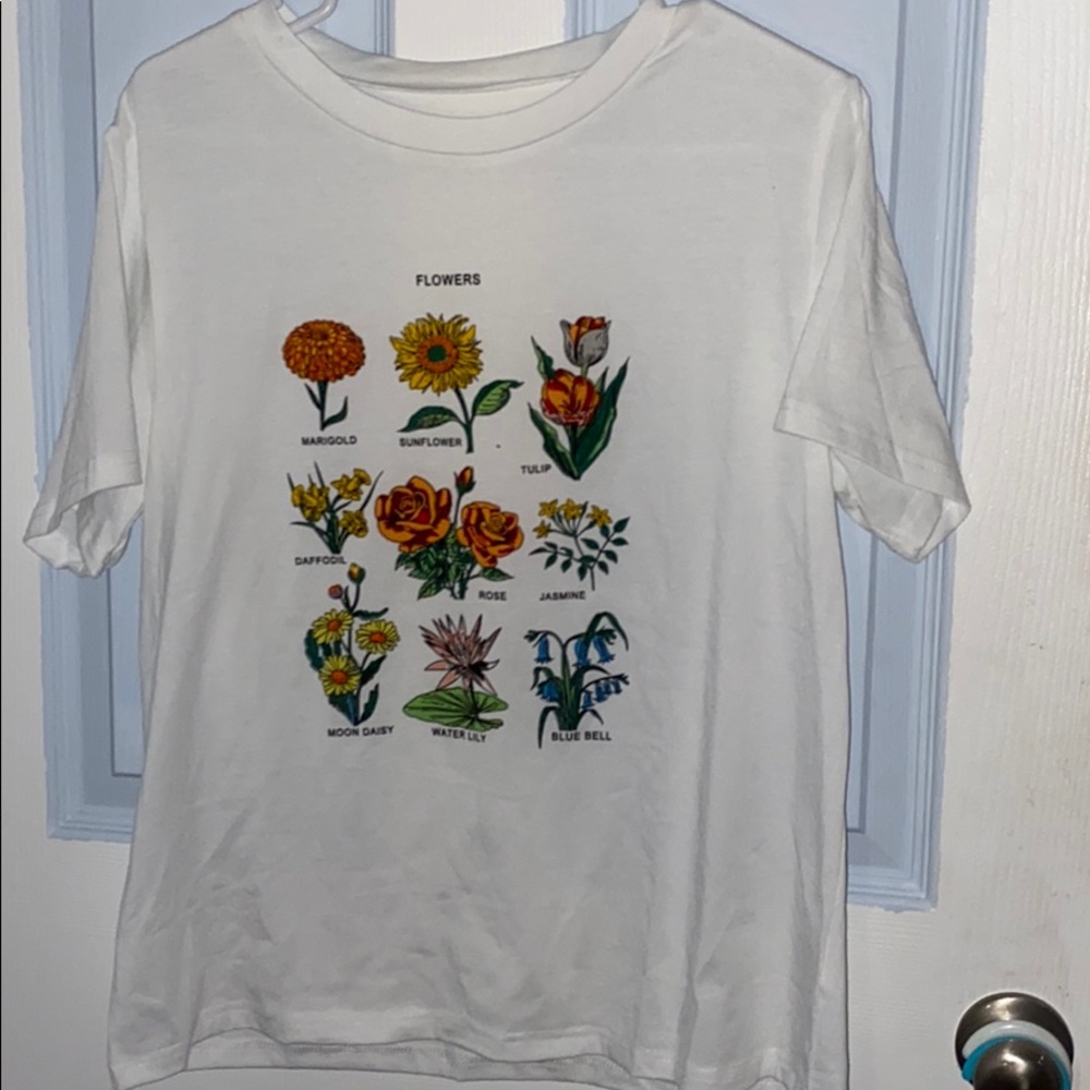 white graphic tee with flowers